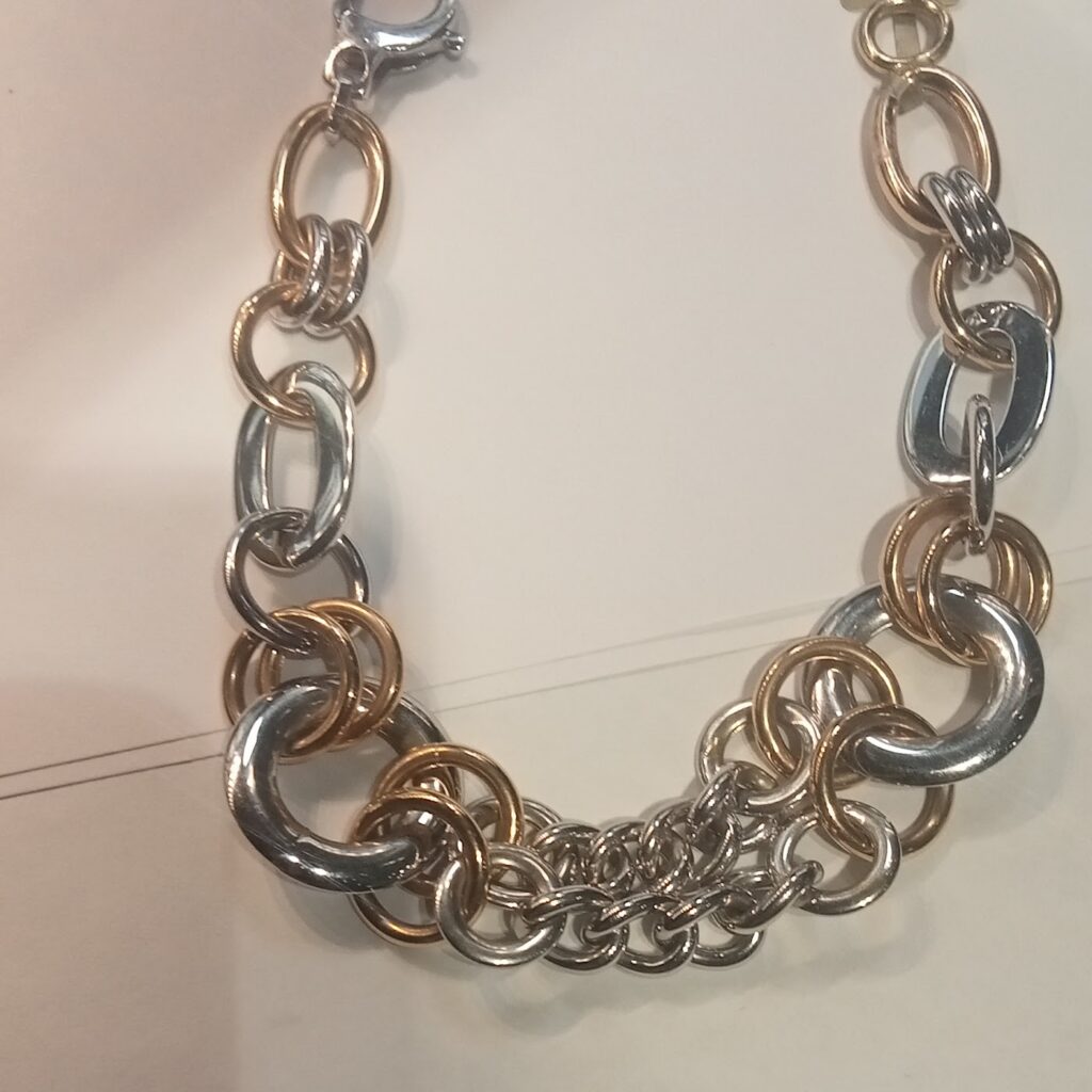 Pulsera de eslabones variados en oro bicolor