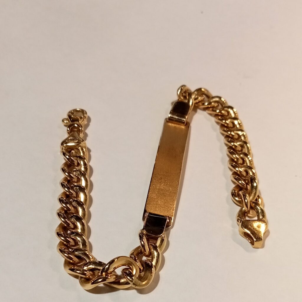Pulsera esclava con cadena tipo cubana en oro amarillo de 18 kilates